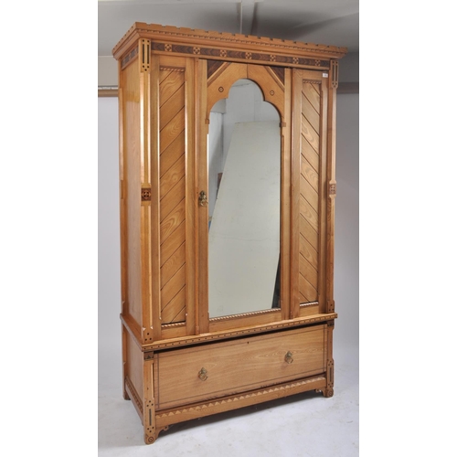 450 - A 19th century Victorian Arts & Crafts ash and specimen wood inlaid single wardrobe armoire. The war... 