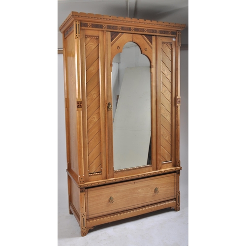 450 - A 19th century Victorian Arts & Crafts ash and specimen wood inlaid single wardrobe armoire. The war... 