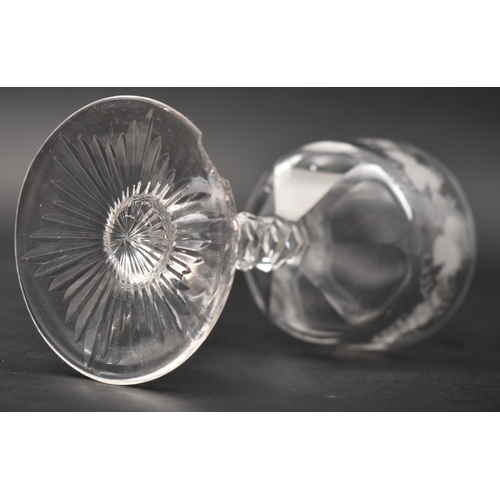 452 - A George III 18th century crystal champagne faceted flute glass, conical bowl with elongated knop. R... 