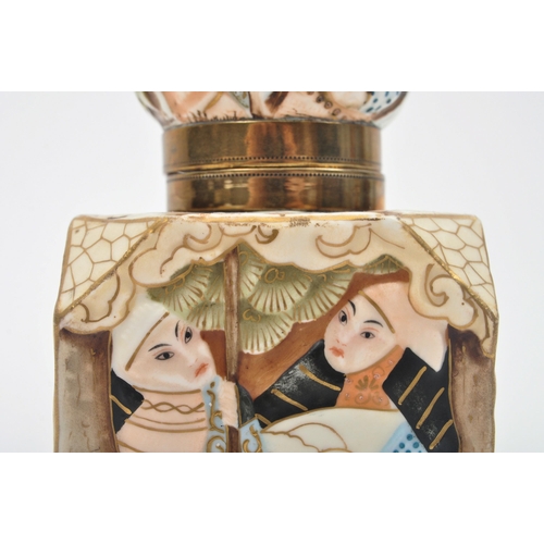 455 - A 19th century Japanese Oriental porcelain cuboid figurative lidded inkwell. The inkwell having a bu... 