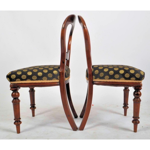 473 - A 19th century mahogany revival dining table with chairs. The suite comprising of a mahogany oval to... 