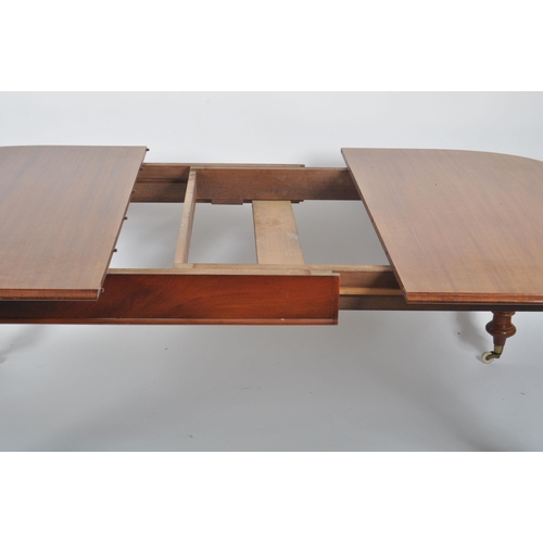 473 - A 19th century mahogany revival dining table with chairs. The suite comprising of a mahogany oval to... 