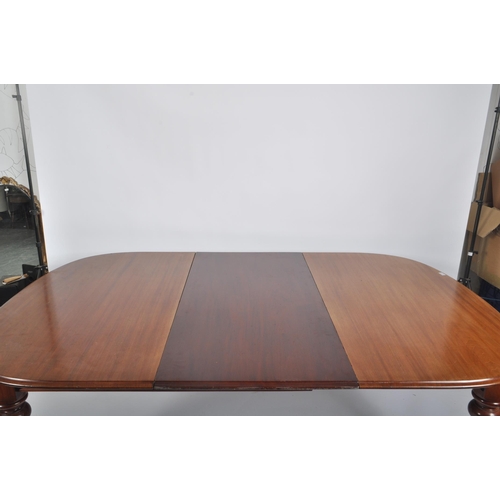 473 - A 19th century mahogany revival dining table with chairs. The suite comprising of a mahogany oval to... 