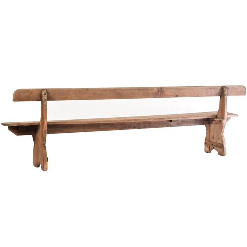 53 - A Victorian 19th century fruitwood refectory farmhouse bench settee. The bench having a single plank... 