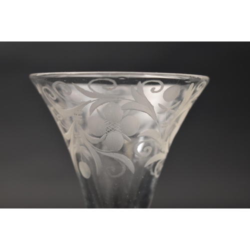 60 - A Jacobites mid 18th century engraved crystal air-twist stem wine glass. Etched trumpet bowl with ro... 