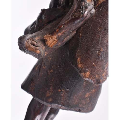 636 - A 19th century Japanese carved root wood figure of a fisherman. The carving stood upright with rod o... 