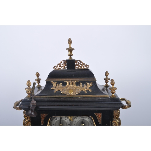 640 - A Victorian 19th century gilt ormolu & ebonised wood eight bells musical bracket clock. The clock ha... 