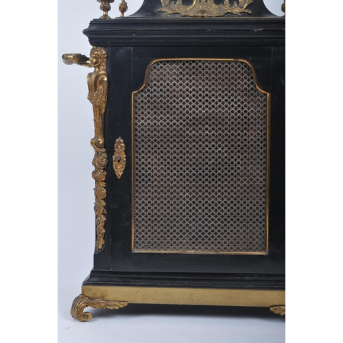 640 - A Victorian 19th century gilt ormolu & ebonised wood eight bells musical bracket clock. The clock ha... 