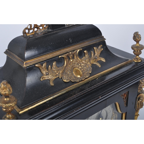 640 - A Victorian 19th century gilt ormolu & ebonised wood eight bells musical bracket clock. The clock ha... 