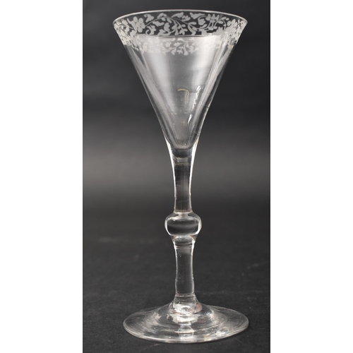 652 - A George II 18th century 1760 crystal hand engraved balusteroid gin / cordial glass. Floral hand etc... 