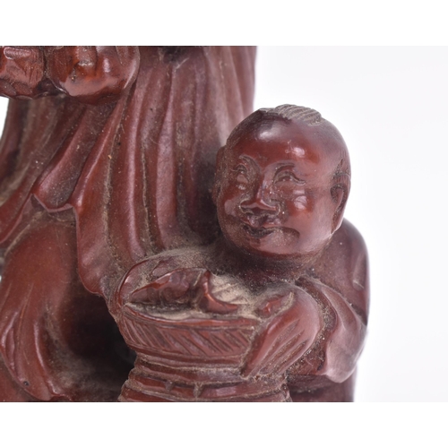 653 - A 19th century Chinese carved wooden fisherman & boy. The carving with basket, bird & boy. Believed ... 