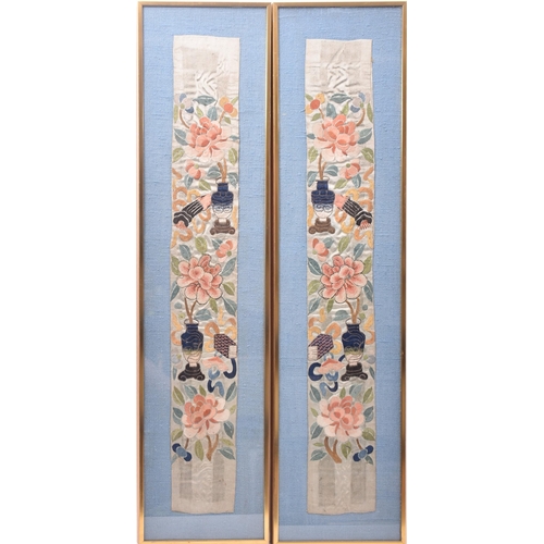 76 - A pair of early 20th century Chinese Oriental silk embroidery decorative panels. Each panel with flo... 