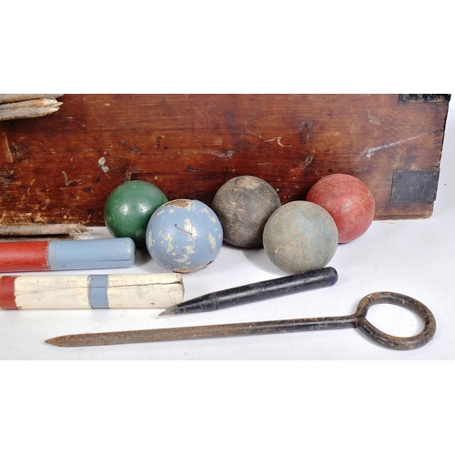 87 - An early 20th century, likely Jacques made, British Croquet set. Appears complete, with four mallets... 