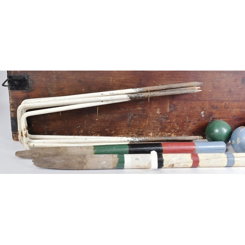 87 - An early 20th century, likely Jacques made, British Croquet set. Appears complete, with four mallets... 