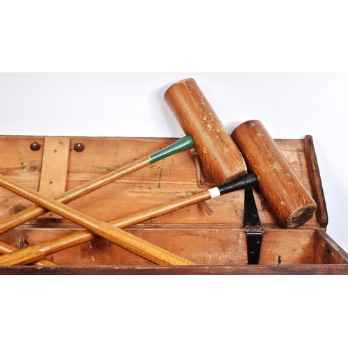 87 - An early 20th century, likely Jacques made, British Croquet set. Appears complete, with four mallets... 