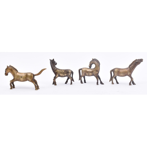 93 - A collection of four 19th century Chinese Oriental Qing Dynasty hollow cast bronze horse sculptures ... 