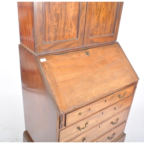 212 - A 19th century George III mahogany estate bookcase bureau. The bureau with twin fielded panel doors ... 