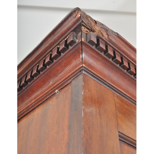 212 - A 19th century George III mahogany estate bookcase bureau. The bureau with twin fielded panel doors ... 