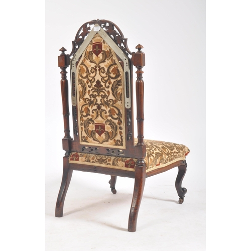 285 - A Victorian 19th century walnut nursing - ladies chair. The chair having a pierced foliate top & bac... 