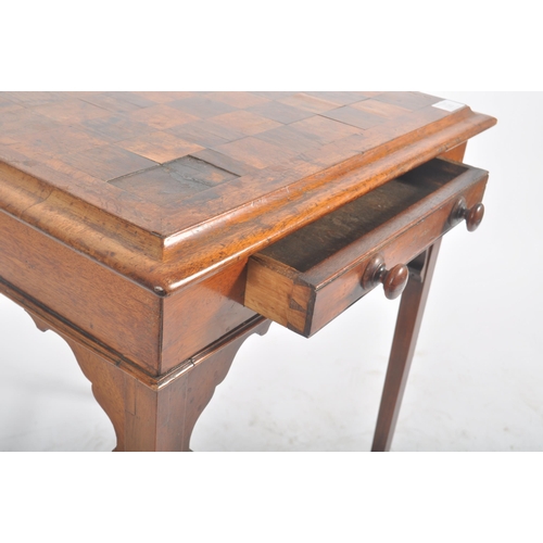 325 - A Victorian 19th century mahogany inlaid game side table. The occasional table having a squared cham... 