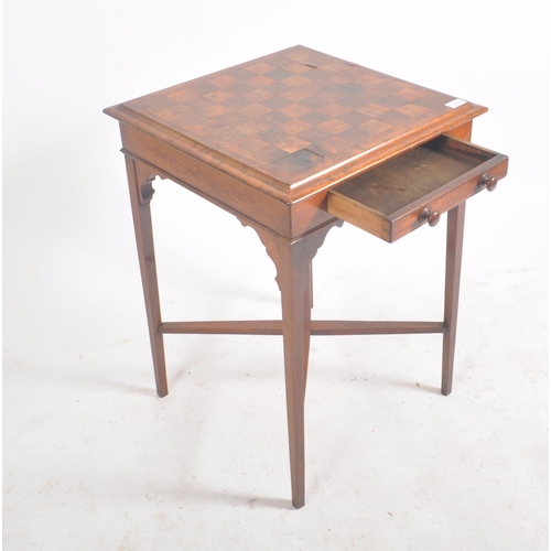 325 - A Victorian 19th century mahogany inlaid game side table. The occasional table having a squared cham... 