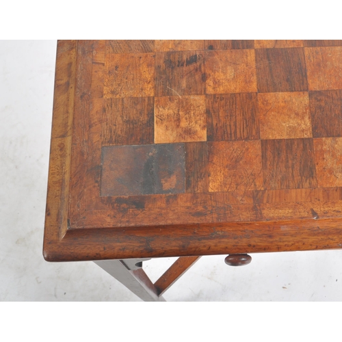 325 - A Victorian 19th century mahogany inlaid game side table. The occasional table having a squared cham... 