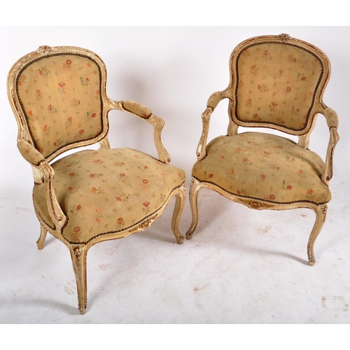 398 - A pair of 19th century French painted walnut framed fauteuils / armchairs. Each having show wood scr... 