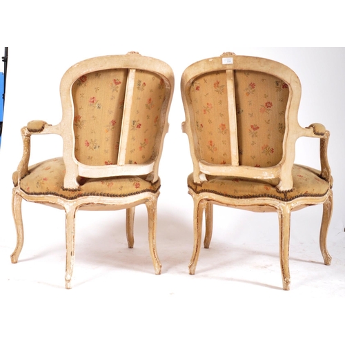 398 - A pair of 19th century French painted walnut framed fauteuils / armchairs. Each having show wood scr... 