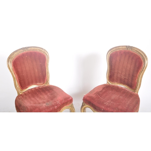 403 - A pair of early Victorian 18th century gilt wood & upholstered English dining chairs. Each chair hav... 