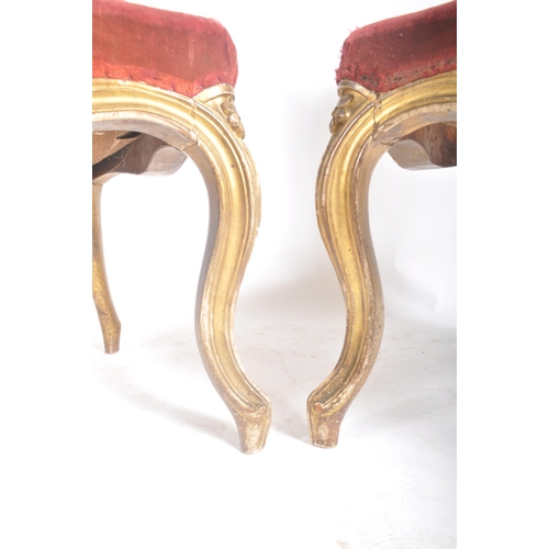 403 - A pair of early Victorian 18th century gilt wood & upholstered English dining chairs. Each chair hav... 