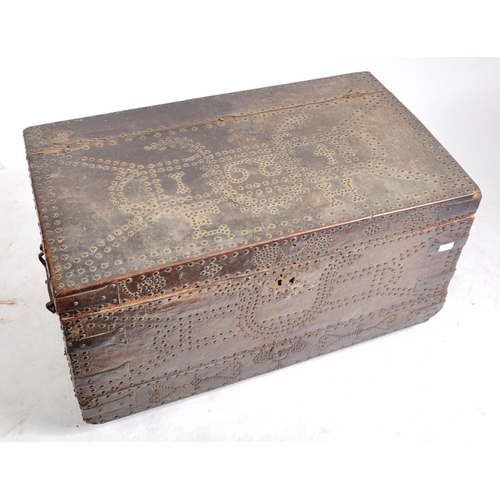 416 - A 17th Century James II oak and leather bound coffer chest. The leather bound and stud worked oak ch... 