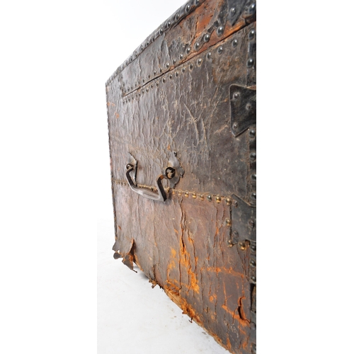 416 - A 17th Century James II oak and leather bound coffer chest. The leather bound and stud worked oak ch... 