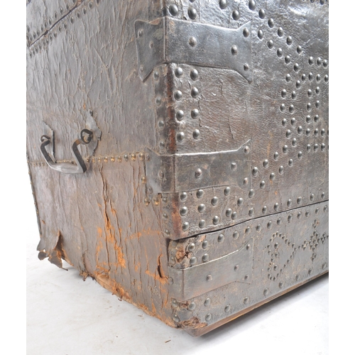 416 - A 17th Century James II oak and leather bound coffer chest. The leather bound and stud worked oak ch... 