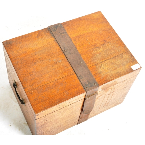 458 - A Victorian 19th century oak campaign iron bound silver chest trunk / canteen of cutlery. The chest ... 