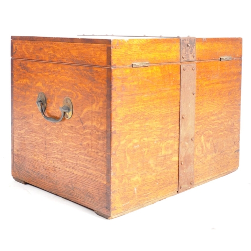 458 - A Victorian 19th century oak campaign iron bound silver chest trunk / canteen of cutlery. The chest ... 