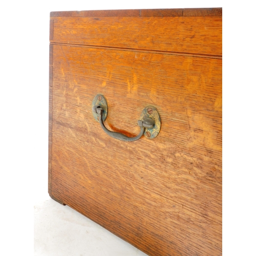 458 - A Victorian 19th century oak campaign iron bound silver chest trunk / canteen of cutlery. The chest ... 