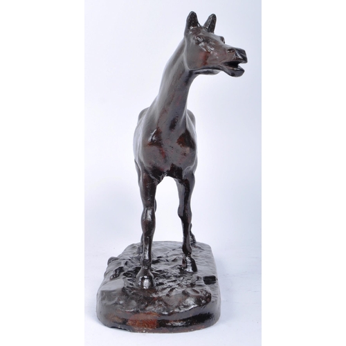 666 - A 20th century plaster study of a horse in motion. The horse painted with a bronze finish and mounte... 