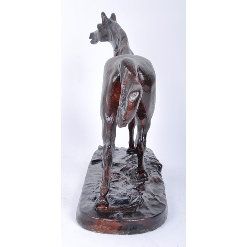 666 - A 20th century plaster study of a horse in motion. The horse painted with a bronze finish and mounte... 