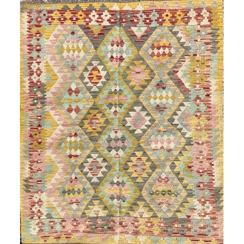 329 - A 20th century Anatolian Turkish Islamic Kilim hand woven floor carpet rug. The rug having a central... 