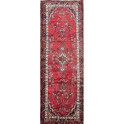 667 - An early 20th century North West Persian Islamic Mahal hand woven floor carpet runner rug. The rug h... 