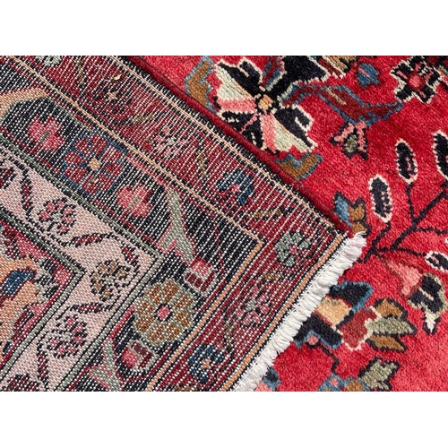 667 - An early 20th century North West Persian Islamic Mahal hand woven floor carpet runner rug. The rug h... 