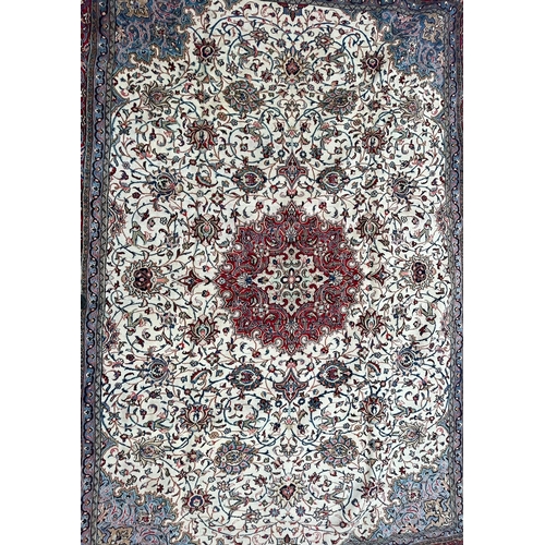 444 - An early 20th century North West Persian Islamic Sarouk hand woven floor carpet rug having a central... 