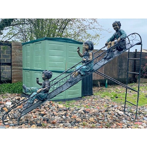 670 - Paul Anderson - A large contemporary bronze worked sculptured garden feature / figural statue group ... 