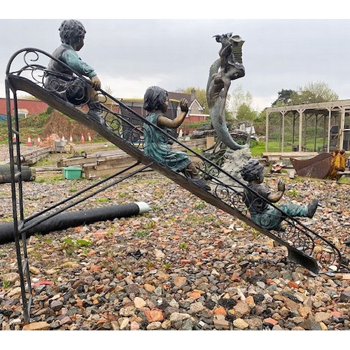 670 - Paul Anderson - A large contemporary bronze worked sculptured garden feature / figural statue group ... 