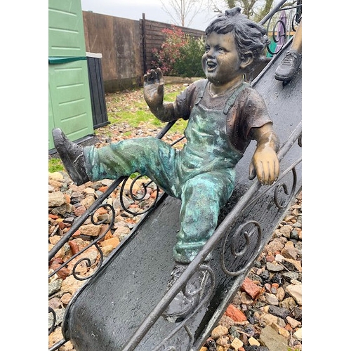 670 - Paul Anderson - A large contemporary bronze worked sculptured garden feature / figural statue group ... 