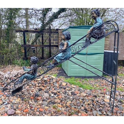 670 - Paul Anderson - A large contemporary bronze worked sculptured garden feature / figural statue group ... 