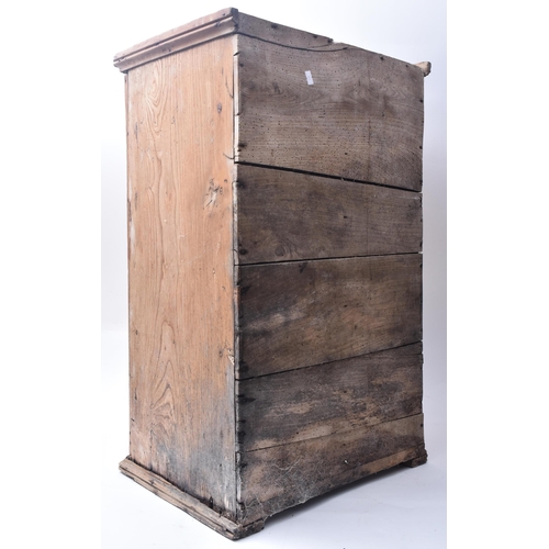 143 - A late 19th century Victorian pine pigeon hole cupboard. The cupboard having a single full length do... 