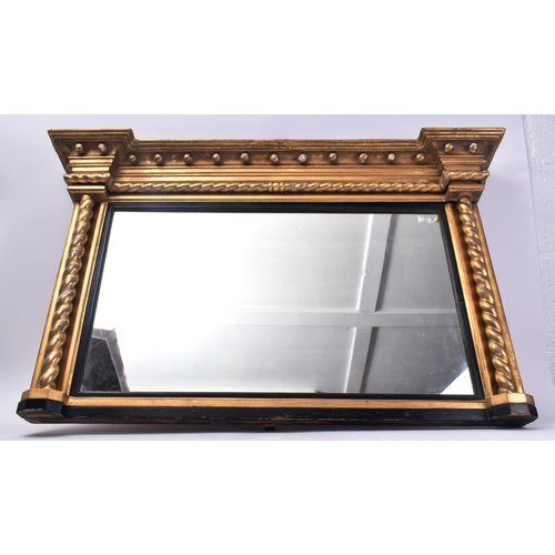 17 - A 19th century giltwood and gesso framed overmantel mirror. The mirror having flyaway cornice over b... 