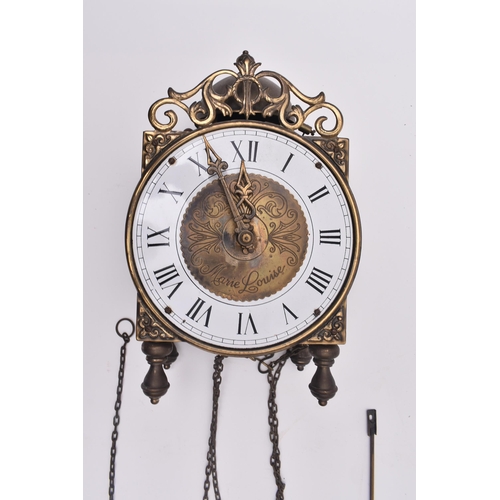 217 - An early 20th century Marie Louise wall / bracket clock. Chain and weights with 8-day movement. The ... 