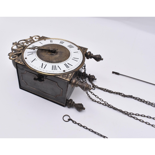 217 - An early 20th century Marie Louise wall / bracket clock. Chain and weights with 8-day movement. The ... 